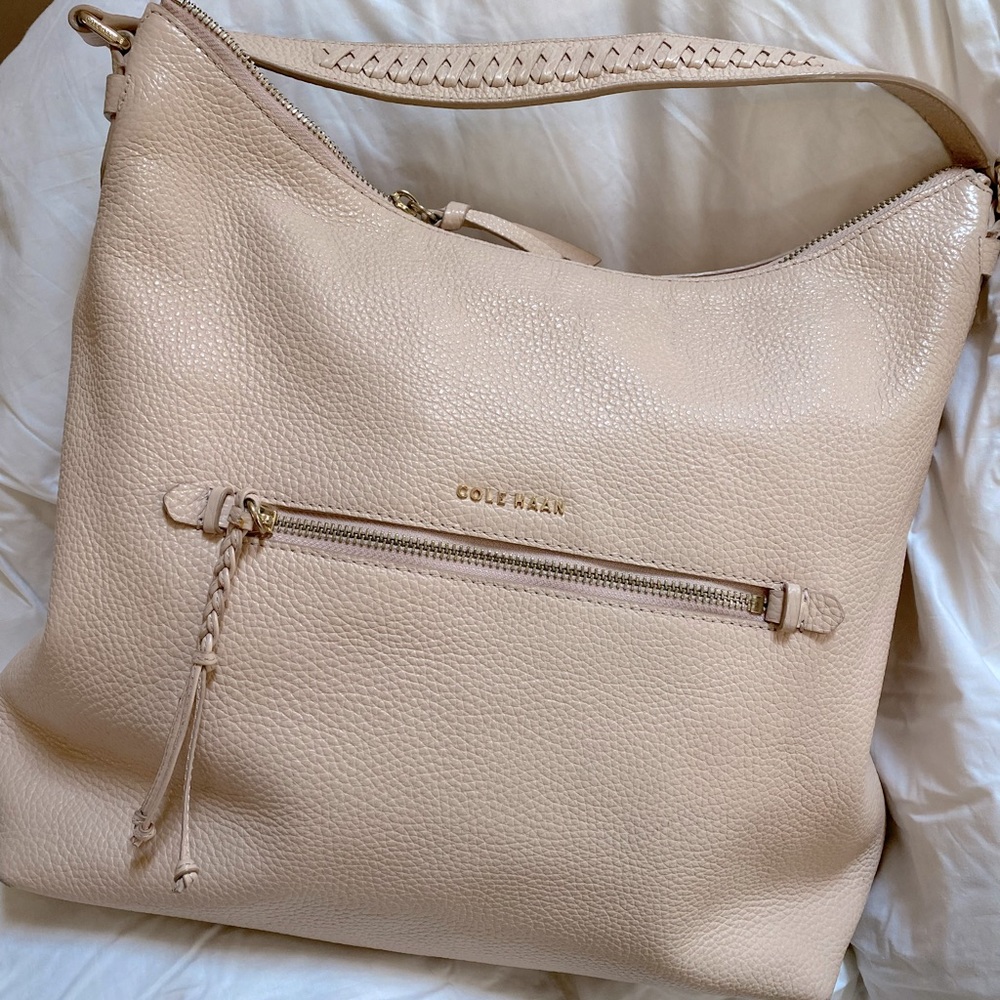 Pretty in pink! Cole Haan leather bag.